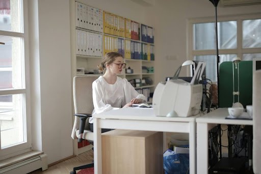 image of a woman on the computer researching accounting automation